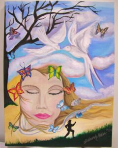 Surreal art of a serene woman's face with butterflies and birds in a dreamy landscape.